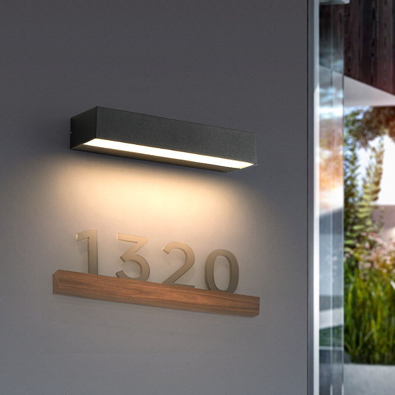 Svadra – Modern utomhusvägglampa i aluminium (IP65)
